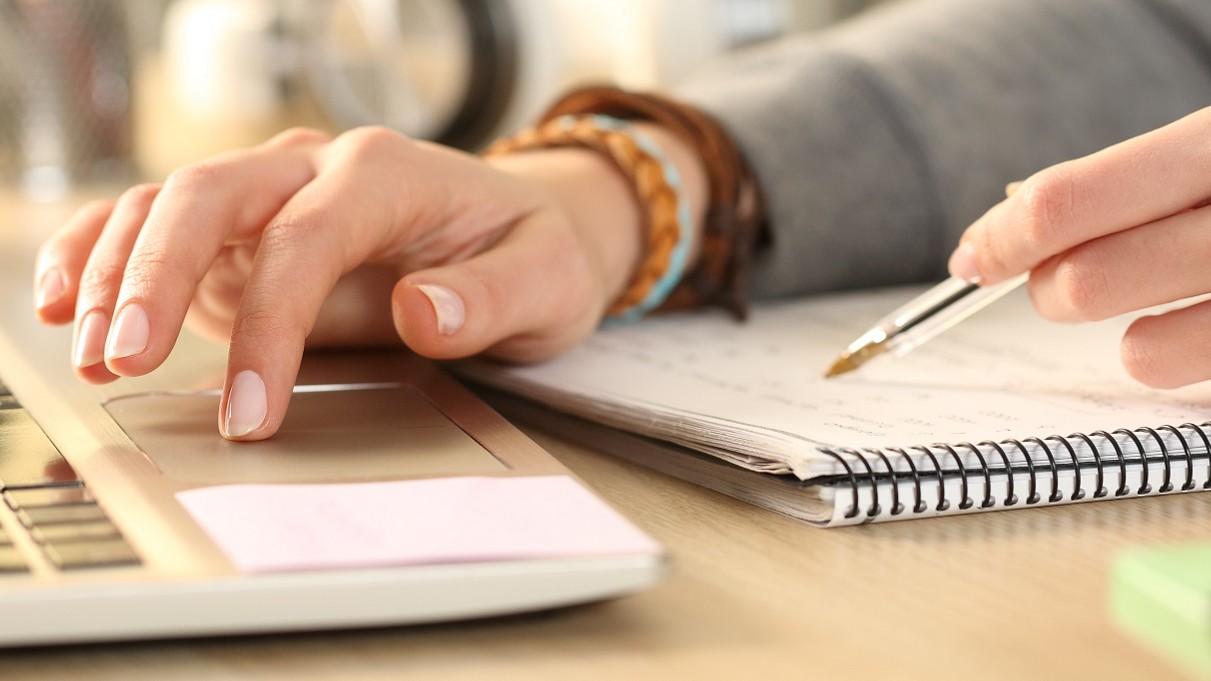 person editing and writing